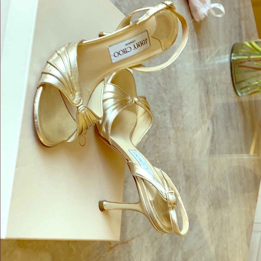 Jimmy Choo gold sling back pump.